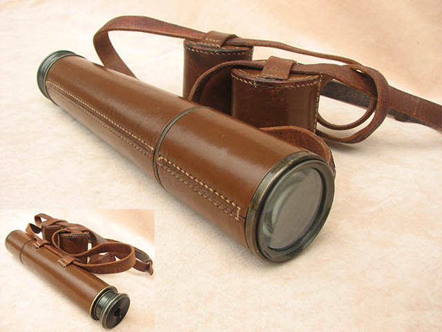 2 draw leather clad telescope signed 'Britannic' by Broadhurst Clarkson & Co. Ltd.
